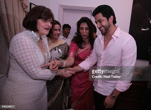 Cherie Blair, wife of former British Prime Minister Tony Blair with Sheriff of Mumbai Indu Shahni and bollywood actor Aftab Shivdasani during a high...