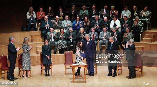 In this handout photo provided by Press Eye, former U.S. President Bill Clinton and and Senator George J. Mitchell attends a ceremony held in the...