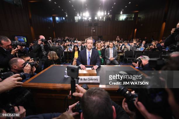 Facebook CEO Mark Zuckerberg arrives to testify before a joint hearing of the US Senate Commerce, Science and Transportation Committee and Senate...