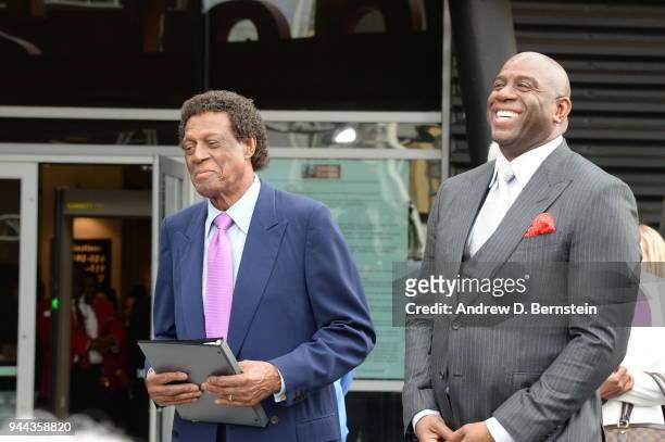 Elgin Baylor and Magic Johnson look on during the Elgin Baylor statue unveiling at STAPLES Center on April 6, 2017 in Los Angeles, California. NOTE...