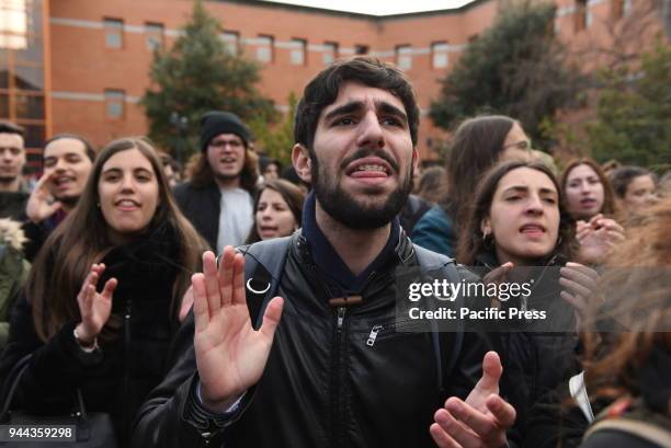 Students shouts slogans as they take part in a protest in Madrid to demand the resignation of Madrid's regional president Cristina Cifuentes, who is...