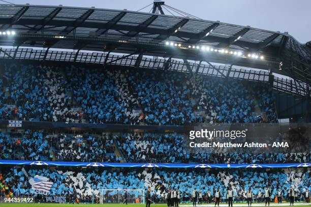 General view of fans of Manchester City as they hold up blue and white banners prior to the UEFA Champions League Quarter Final Second Leg match at...