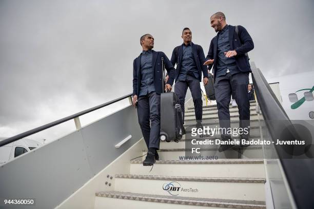 Douglas Costa, Alex Sandro and Stefano Sturaro of Juventus arrive in Madrid on April 10, 2018 in Madrid, Spain.