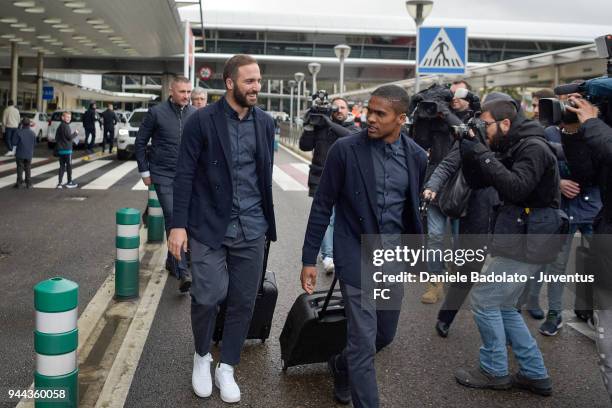 Gonzalo Higuain and Douglas Costa of Juventus arrive in Madrid on April 10, 2018 in Madrid, Spain.