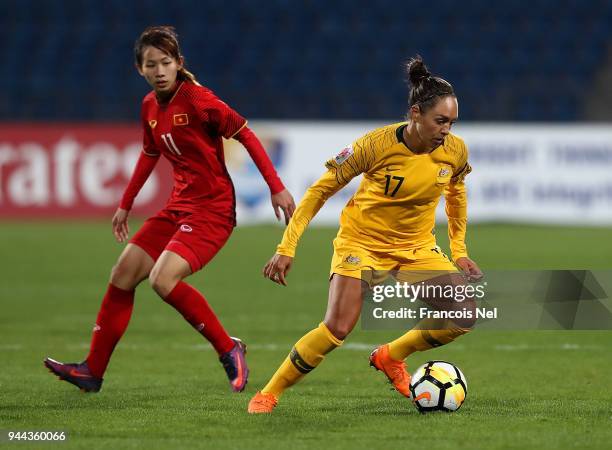 Kyah Simon of Australia and Nguyen Thi Thuy Hang of Vietnam in action during the AFC Women's Asian Cup Group B match between Vietnam and Australia at...