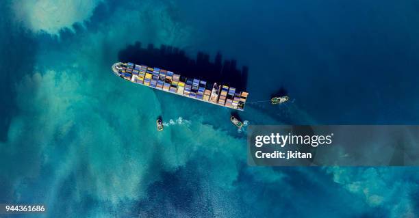 cargo ship - boats moored stock pictures, royalty-free photos & images