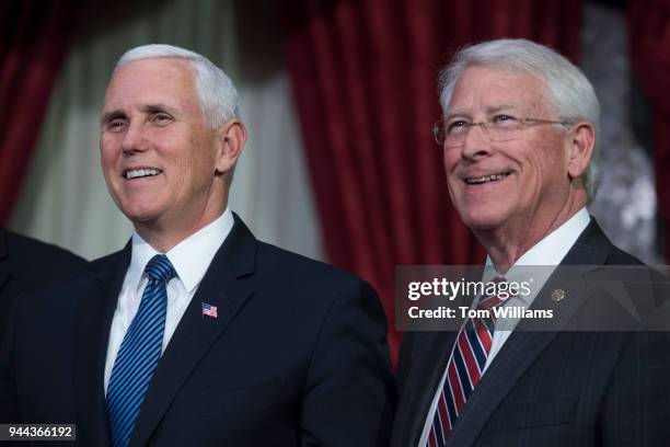 Vice President Mike Pence, left, and Sen. Roger Wicker, R-Miss., attend the swearing-in ceremony for Sen. Cindy Hyde-Smith, R-Miss., in the Capitol's...