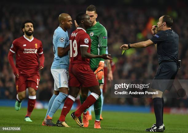 Sadio Mane of Liverpool brings down Nicolas Otamendi of Mancity and gets booked during the UEFA Champions League Quarter Final Second Leg match...