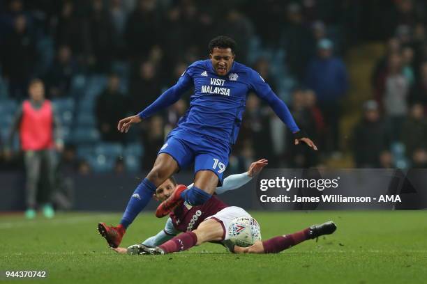 Nathaniel Mendez-Laing of Cardiff City is fouled by Conor Hourihane of Aston Villa during the Premier League match between Leicester City and...