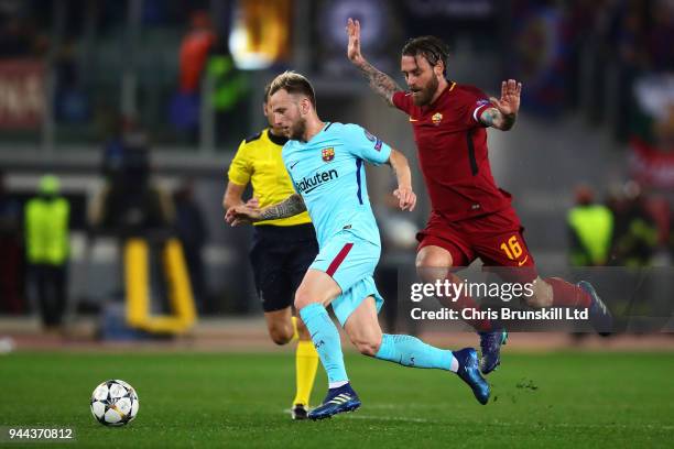 Daniele De Rossi of AS Roma in action with Ivan Rakitic of FC Barcelona during the UEFA Champions League Quarter Final, second leg match between AS...