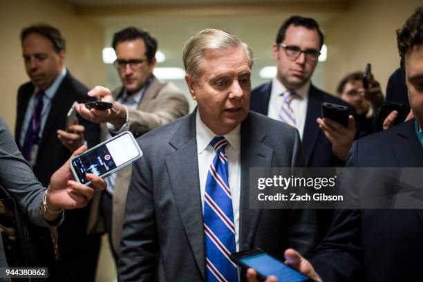 Sen. Lindsey Graham speaks to reporters in the Senate Basement on Capitol Hill on April 10, 2018 in Washington, DC. Senate lawmakers addressed the...