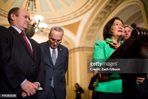 Sen. Mazie Hirono speaks during a weekly news conference on Capitol Hill on April 10, 2018 in Washington, DC. Also pictured are Sen. Chris Coons ,...
