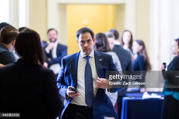 Sen. Marco Rubio leaves a weekly policy luncheon with Republican lawmakers on Capitol Hill on April 10, 2018 in Washington, DC. Senate lawmakers...