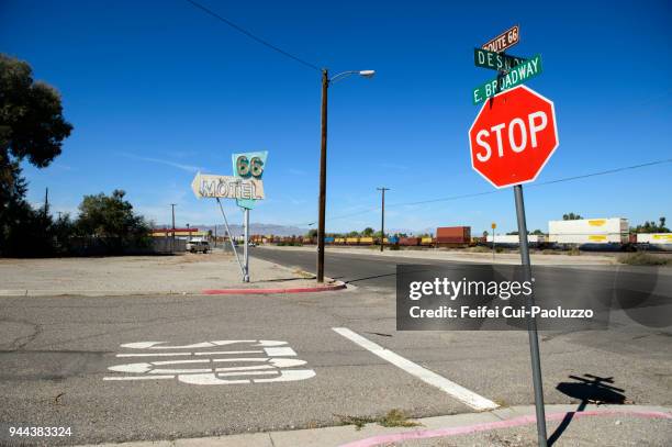 motel sign and railway at needles, california, usa - san bernardino california fotografías e imágenes de stock