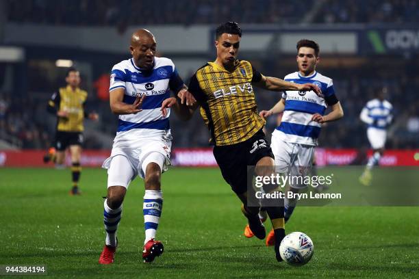 Alex Baptiste of Queen's Park Rangers battles with Joey Pelupessy of Sheffield Wednesday during the Sky Bet Championship match between Queens Park...