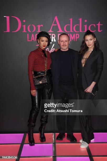 Ambush Creative Director YOON, Makeup artist Peter Philips and Model Bella Hadid attend the Dior Addict Lacquer Plump Party at 1 OAK on April 10,...