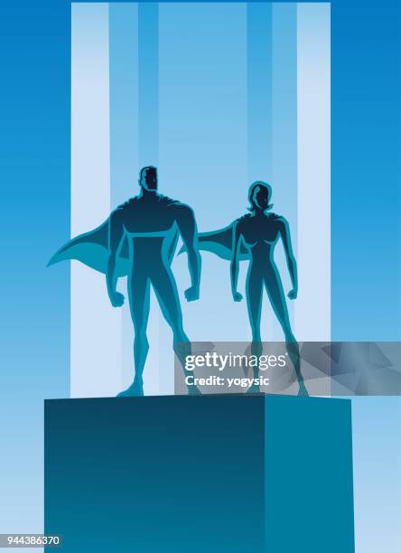vector retro superhero couple silhouette illustration - superhero shadow stock illustrations