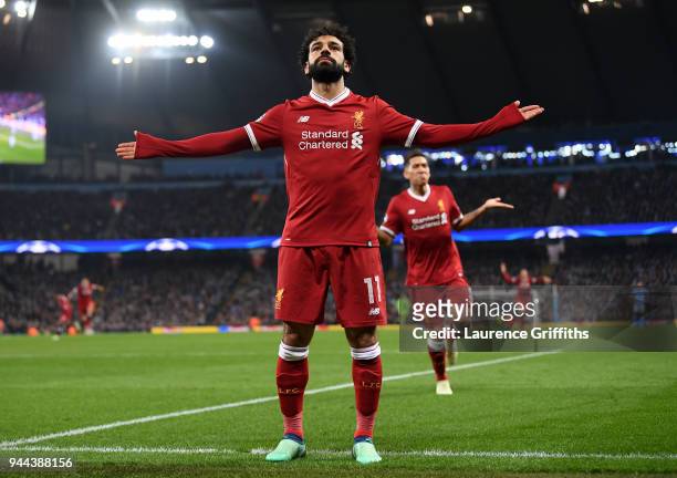 Mohamed Salah of Liverpool celebrates after scoring his sides first goal during the UEFA Champions League Quarter Final Second Leg match between...
