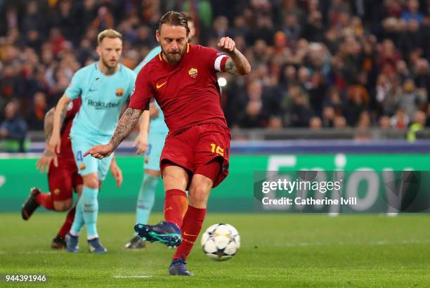 Daniele De Rossi of AS Roma scores his sides second goal from the penalty spot during the UEFA Champions League Quarter Final Second Leg match...