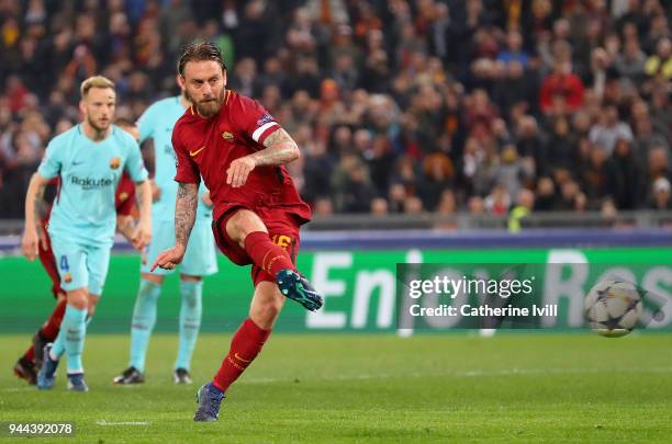 Daniele De Rossi of AS Roma scores his sides second goal from the penalty spot during the UEFA Champions League Quarter Final Second Leg match...