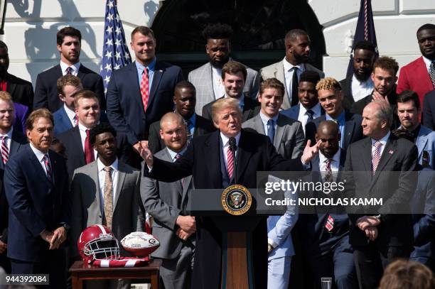 President Donald Trump receives the 2017 NCAA football national champions the Alabama Crimson Tide at the White House in Washington, DC, on April 10,...