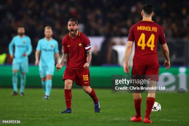 Daniele De Rossi of AS Roma celebrates scoring his side's second goal from the penalty spot during the UEFA Champions League Quarter Final, second...