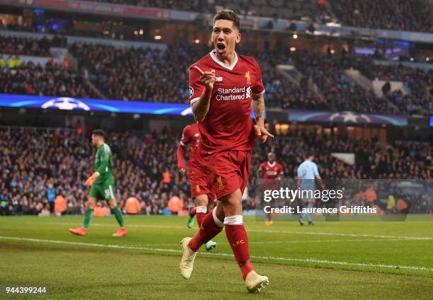 Roberto Firmino of Liverpool celebrates after scoring his sides second goal during the UEFA Champions League Quarter Final Second Leg match between...