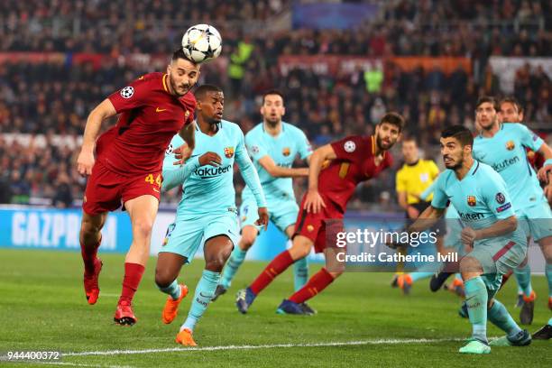 Kostas Manolas of AS Roma scores his sides third goal during the UEFA Champions League Quarter Final Second Leg match between AS Roma and FC...