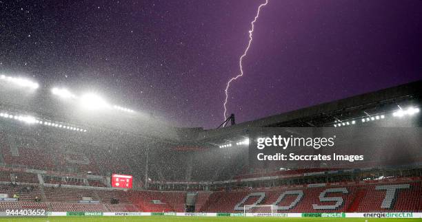 Lightning strikes near stadium of PSV during the Dutch Jupiler League match between PSV U23 v Go Ahead Eagles at the De Herdgang on April 10, 2018 in...