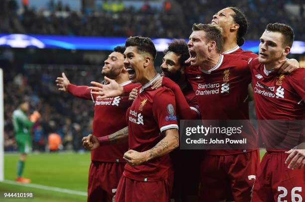 Roberto Firmino of Liverpool celebrates the second goal during the UEFA Champions League Quarter Final Second Leg match between Manchester City and...