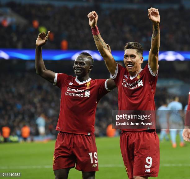 Roberto Firmino of Liverpool celebrates the second goal during the UEFA Champions League Quarter Final Second Leg match between Manchester City and...