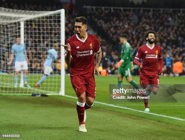 Roberto Firmino of Liverpool celebrates the second goal during the UEFA Champions League Quarter Final Second Leg match between Manchester City and...