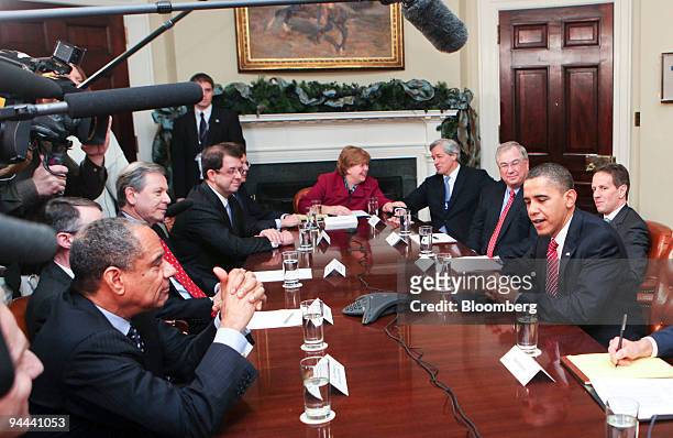 President Barack Obama, second from right, meets with, clockwise from left, Ken Chenault, president and chief executive officer of American Express...