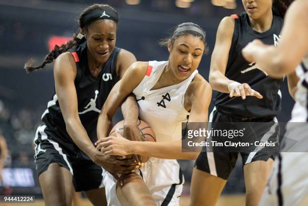 April 08: Olivia Nelson-Ododa Winder-Barrow H.S. Winder, GA and Queen Egbo Travis H.S. Richmond, TX compete for a loose ball during the Jordan Brand...