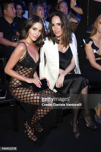 Olivia Culpo and Louise Roe attend the Calzedonia Summer Show on April 10, 2018 in Verona, Italy.