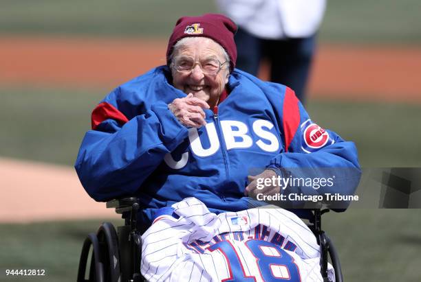 Sister Jean Dolores Schmidt reacts after throwing out a ceremonial first pitch before the Chicago Cubs and Pittsburgh Pirates play on Tuesday, April...