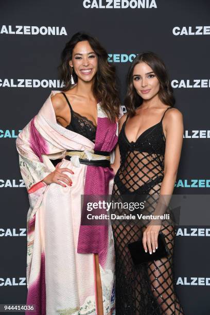 Emi Renata and Olivia Culpo attend the Calzedonia Summer Show on April 10, 2018 in Verona, Italy.