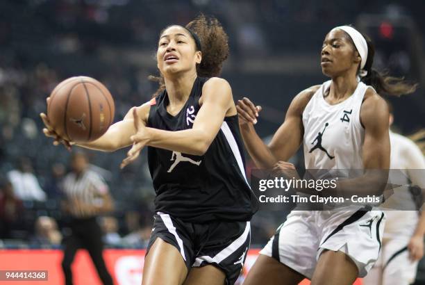 April 08: Shakira Austin Riverdale Baptist School, Upper Marlboro, MD drives to the basket defended by Charli Collier Barbers Hill H.S. Mont Belvieu,...