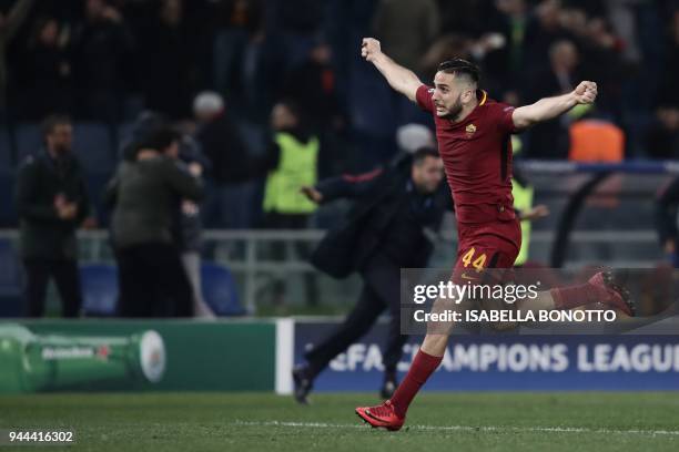 Roma's Greek defender Kostas Manolas celebrates after winning the UEFA Champions League quarter-final second leg football match between AS Roma and...