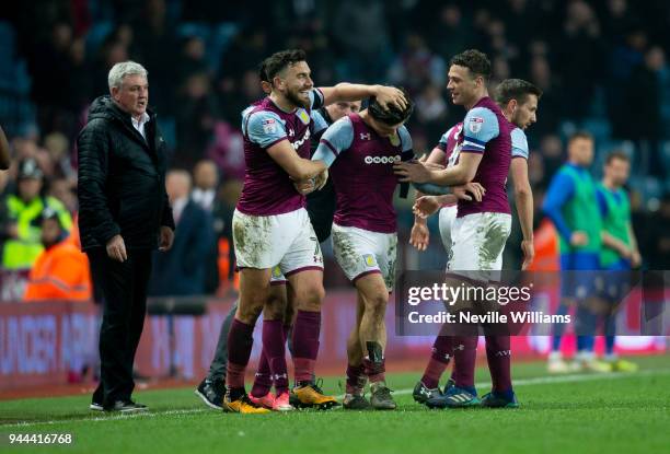 Jack Grealish of Aston Villa scores for Aston Villa during the Sky Bet Championship match between Aston Villa and Cardiff City at Villa Park on April...