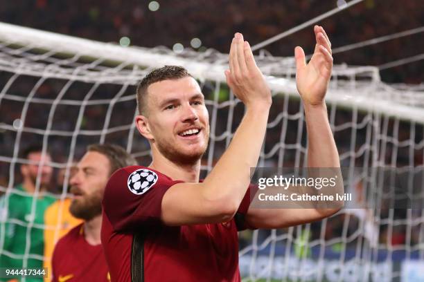 Edin Dzeko of AS Roma celebrates victory after the UEFA Champions League Quarter Final Second Leg match between AS Roma and FC Barcelona at Stadio...