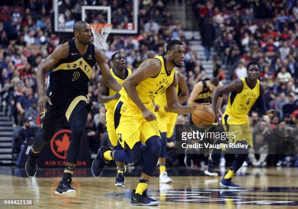 Thaddeus Young of the Indiana Pacers dribbles the ball during the first half of an NBA game against the Toronto Raptors at Air Canada Centre on April...