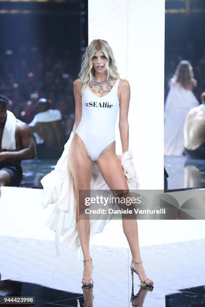 Devon Windsor walks the runway at the Calzedonia Summer Show on April 10, 2018 in Verona, Italy.