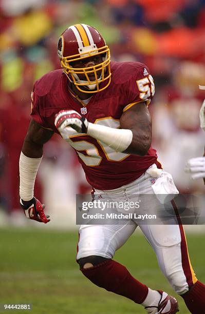 Lavar Arrington of the Washington Redskins in postion during a NFL football game against the Phoenix Cardinals on January 6, 2002 at FedEx Field in...