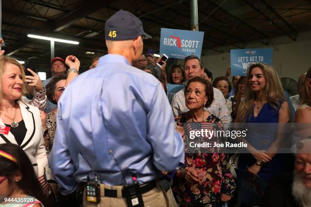 Florida Governor Rick Scott greets people as he holds a Senate campaign rally at the Interstate Beverage Corp. On April 10, 2018 in Hialeah, Florida....