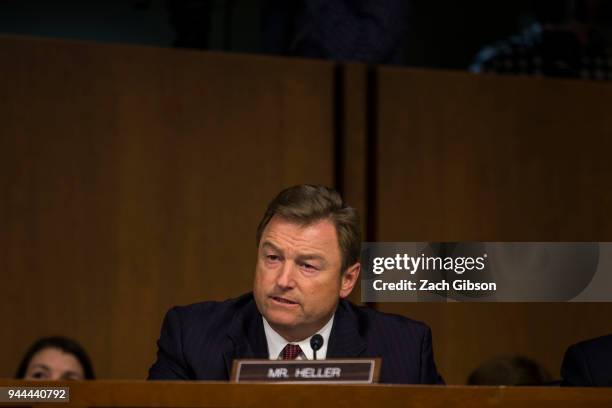 Sen. Dean Heller asks questions as Facebook co-founder, Chairman and CEO Mark Zuckerberg testifies before a combined Senate Judiciary and Commerce...