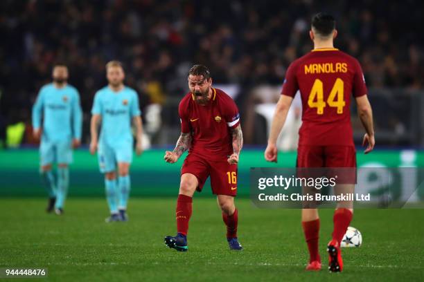 Daniele De Rossi of AS Roma celebrates scoring his side's second goal from the penalty spot during the UEFA Champions League Quarter Final, second...