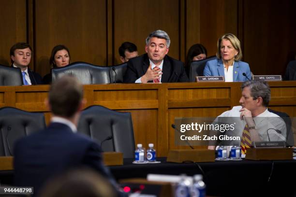 Sen. Cory Gardner speaks as Shelly Moore Capito looks on during testimony by Facebook co-founder, Chairman and CEO Mark Zuckerberg before a combined...