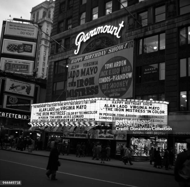 The Paramount Theatre marquee reads "The Paramount is 26 years young with this great 2 for 1 show; Alan Ladd and Virgnia Mayo 'The Iron Mistress'...