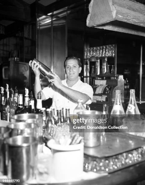 Bartender fixes a drink on September 5, 1952 at Chateau Gardens in New York.